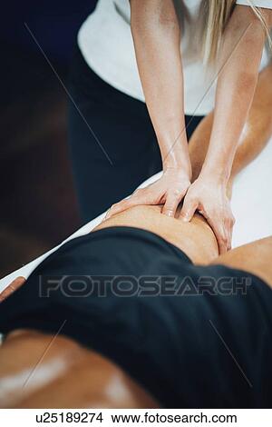 Sports massage View Large Photo Image Picture - Sports massage. Fotosearch