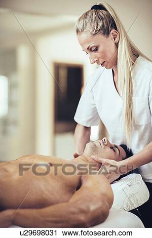 Sports massage View Large Photo Image Stock Image - Sports massage. Fotosearch