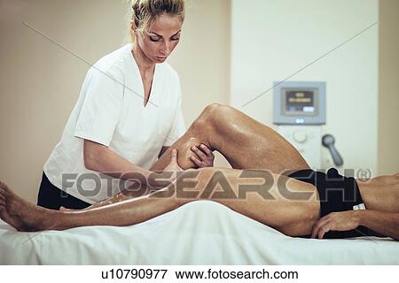 Stock Photo - Sports massage. Fotosearch