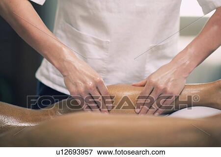 Sports massage View Large Photo Image Stock Photo - Sports massage. Fotosearch