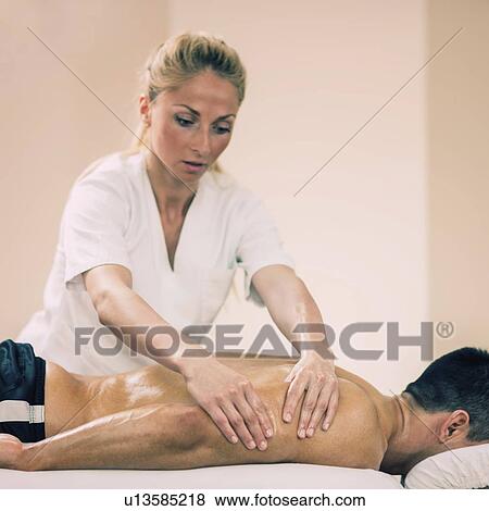 Sports massage View Large Photo Image Stock Photo - Sports massage. Fotosearch