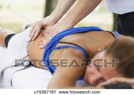 Sports massage View Large Photo Image Stock Photo - Sports massage. Fotosearch
