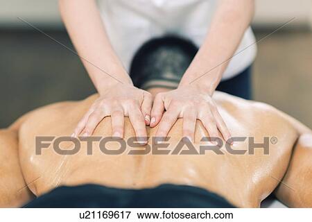 Stock Photo - Sports massage. Fotosearch