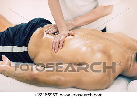 Stock Photo - Sports massage. Fotosearch
