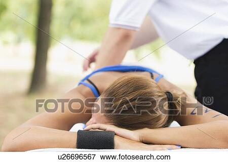 Sports massage View Large Photo Image Stock Photo - Sports massage. Fotosearch