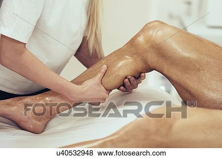 Sports massage View Large Photo Image Stock Photo - Sports massage. Fotosearch