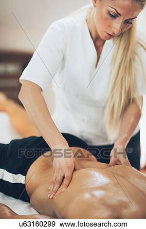 Sports massage View Large Photo Image Stock Photo - Sports massage. Fotosearch