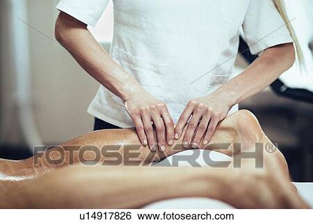 Stock Photograph - Sports massage. Fotosearch