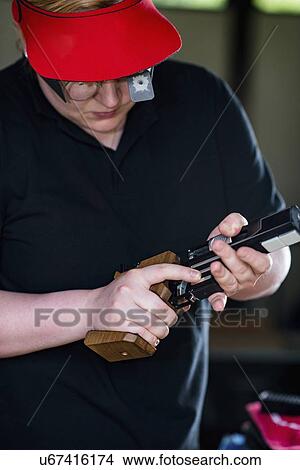 Sports pistol practice View Large Photo Image Picture - Sports pistol practice. Fotosearch