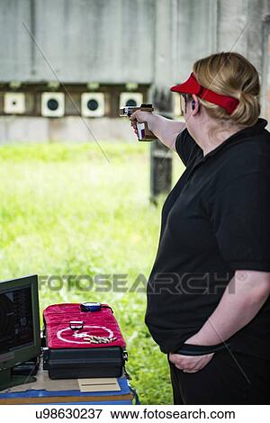 Stock Photo - Sports pistol practice. Fotosearch