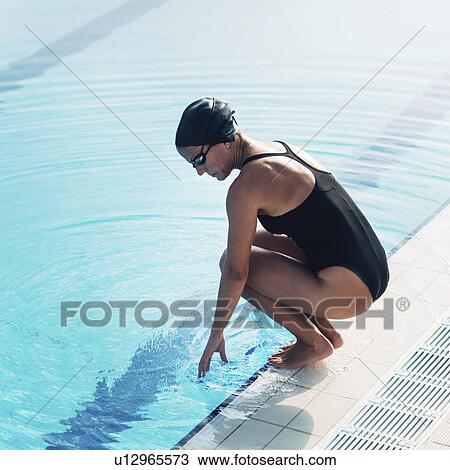 Swimmer next to pool View Large Photo Image Stock Image - Swimmer next to pool. Fotosearch