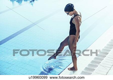Swimmer next to pool View Large Photo Image Stock Photo - Swimmer next to pool. Fotosearch
