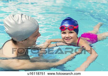 Stock Image - Swimming lesson. Fotosearch