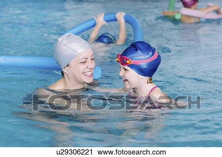 Stock Image - Swimming lesson. Fotosearch