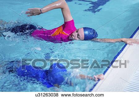 Stock Photo - Swimming lesson. Fotosearch