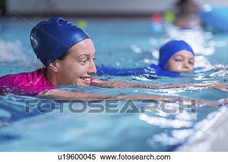 Stock Photography - Swimming lesson. Fotosearch