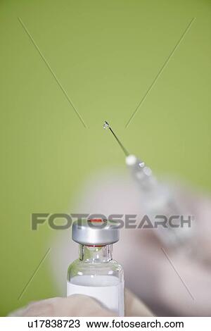 Syringe and vaccine vial View Large Photo Image Stock Image - Syringe and vaccine vial. Fotosearch
