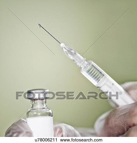 Syringe and vaccine vial View Large Photo Image Stock Image - Syringe and vaccine vial. Fotosearch