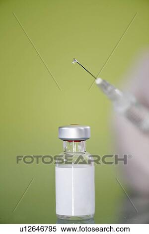 Syringe and vaccine vial View Large Photo Image Stock Photography - Syringe and vaccine vial. Fotosearch