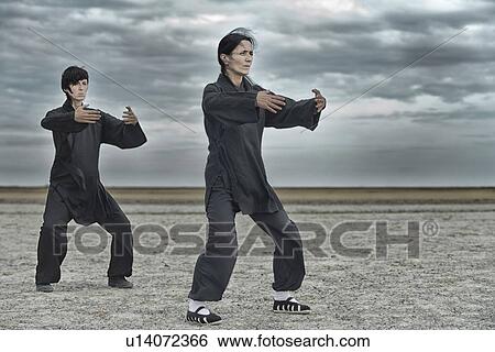 Stock Photograph - Tai Chi Chuan practice. Fotosearch