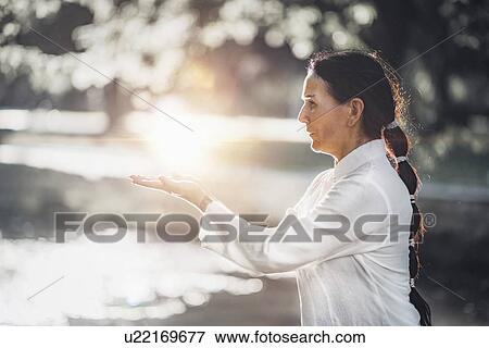 Stock Photo - Tai Chi practice. Fotosearch