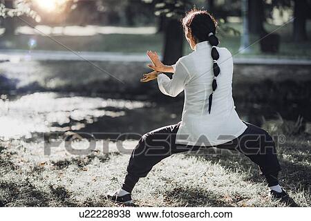Stock Photo - Tai Chi practice. Fotosearch