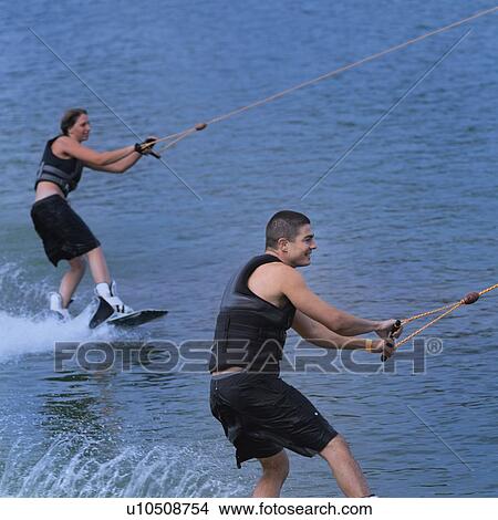 Picture - Tandem wakeboarding. Fotosearch