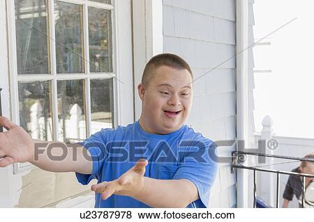 Stock Photo - Teen with Down Syndrome. Fotosearch