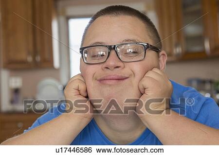 Teen with Down Syndrome View Large Photo Image Stock Photograph - Teen with Down Syndrome. Fotosearch