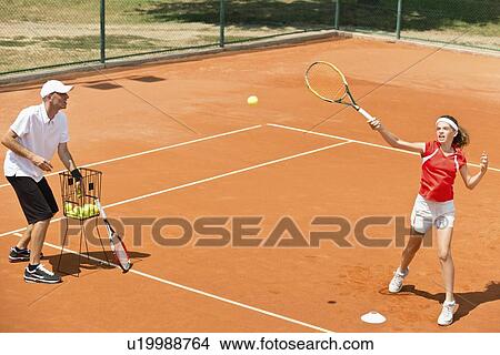 Picture - Tennis lesson. Fotosearch