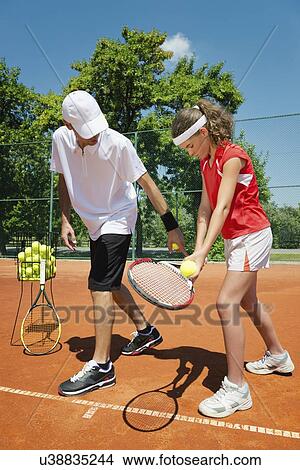 Tennis lesson View Large Photo Image Picture - Tennis lesson. Fotosearch