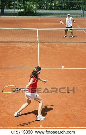 Stock Image - Tennis lesson. Fotosearch