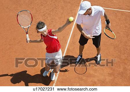 Stock Image - Tennis lesson. Fotosearch