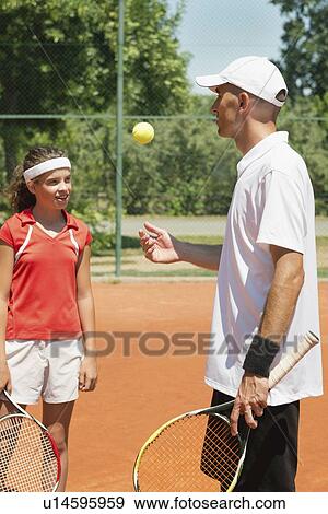 Stock Photo - Tennis lesson. Fotosearch