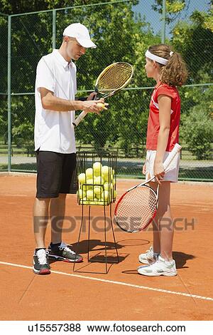 Tennis lesson View Large Photo Image Stock Photo - Tennis lesson. Fotosearch