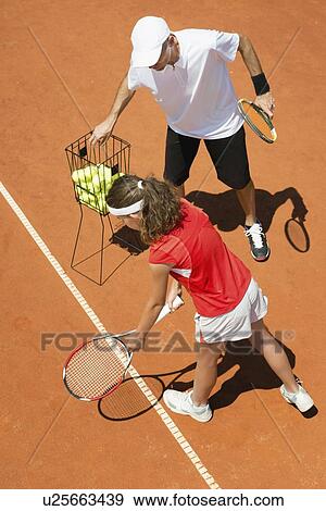 Stock Photo - Tennis lesson. Fotosearch