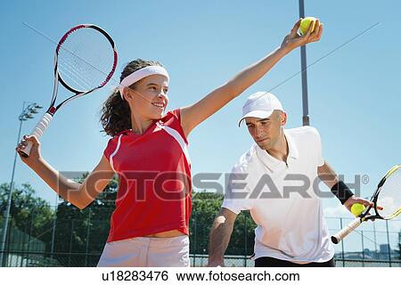 Tennis lesson View Large Photo Image Stock Photograph - Tennis lesson. Fotosearch