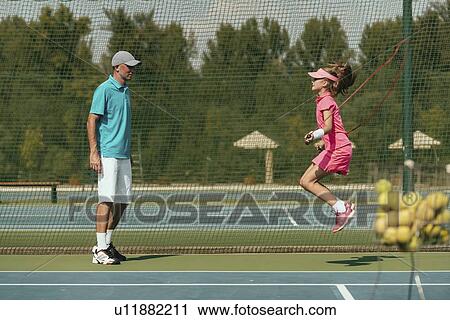 Stock Image - Tennis training. Fotosearch