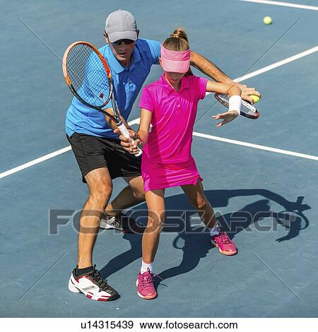 Tennis training View Large Photo Image Stock Photo - Tennis training. Fotosearch