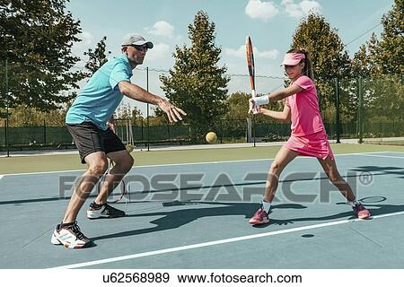 Tennis training View Large Photo Image Stock Photo - Tennis training. Fotosearch
