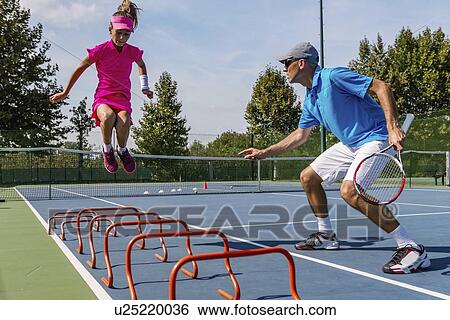 Stock Photograph - Tennis training. Fotosearch