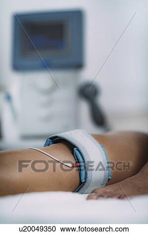TENS treatment for knee View Large Photo Image Stock Image - TENS treatment for knee. Fotosearch