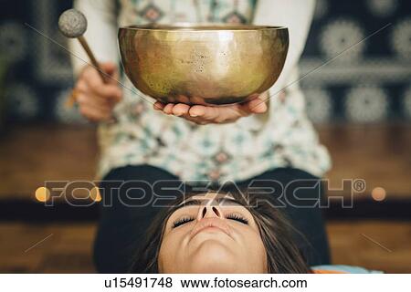Tibetan singing bowl therapy View Large Photo Image Stock Photo - Tibetan singing bowl therapy. Fotosearch