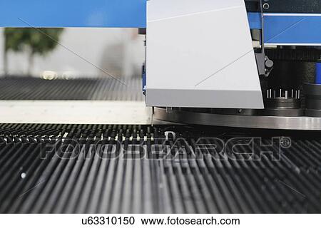 Tin punching machine View Large Photo Image Stock Image - Tin punching machine. Fotosearch