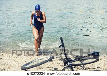 Picture - Triathlete in training. Fotosearch