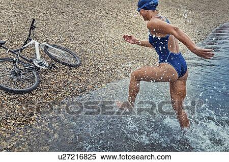 Stock Photography - Triathlete in training. Fotosearch