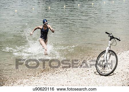 Stock Photograph - Triathlon training. Fotosearch