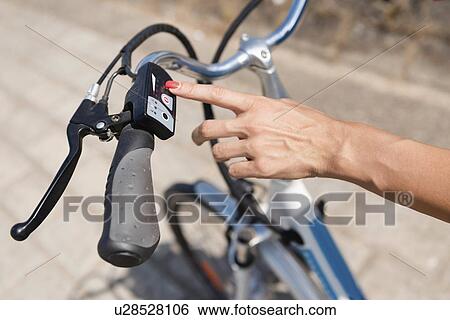 Turning on electric bicycle View Large Photo Image Stock Photograph - Turning on electric bicycle. Fotosearch