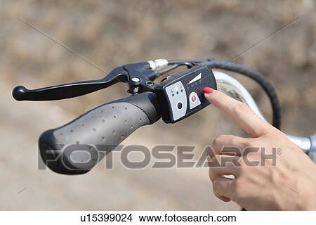 Turning on electric bike View Large Photo Image Picture - Turning on electric bike. Fotosearch