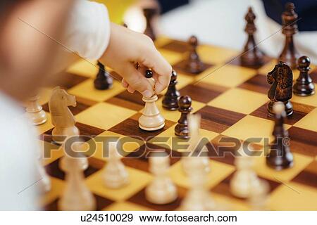 Two boys playing chess View Large Photo Image Stock Photo - Two boys playing chess. Fotosearch